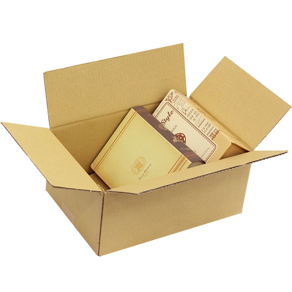 オーダーメイド60サイズダンボールの画像に物を入れてる画像